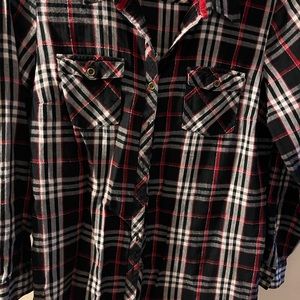 Woman’s medium flannel shirt